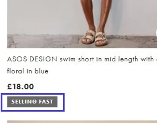 An ASOS category grid, with a “SELLING FAST” badge boxed under the price of a swim short.