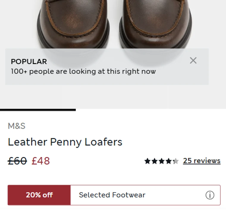 A Marks & Spencer product page for Leather Penny Loafers, with a panel over the photograph headed “POPULAR” reading “100+ people are looking at this right now”.